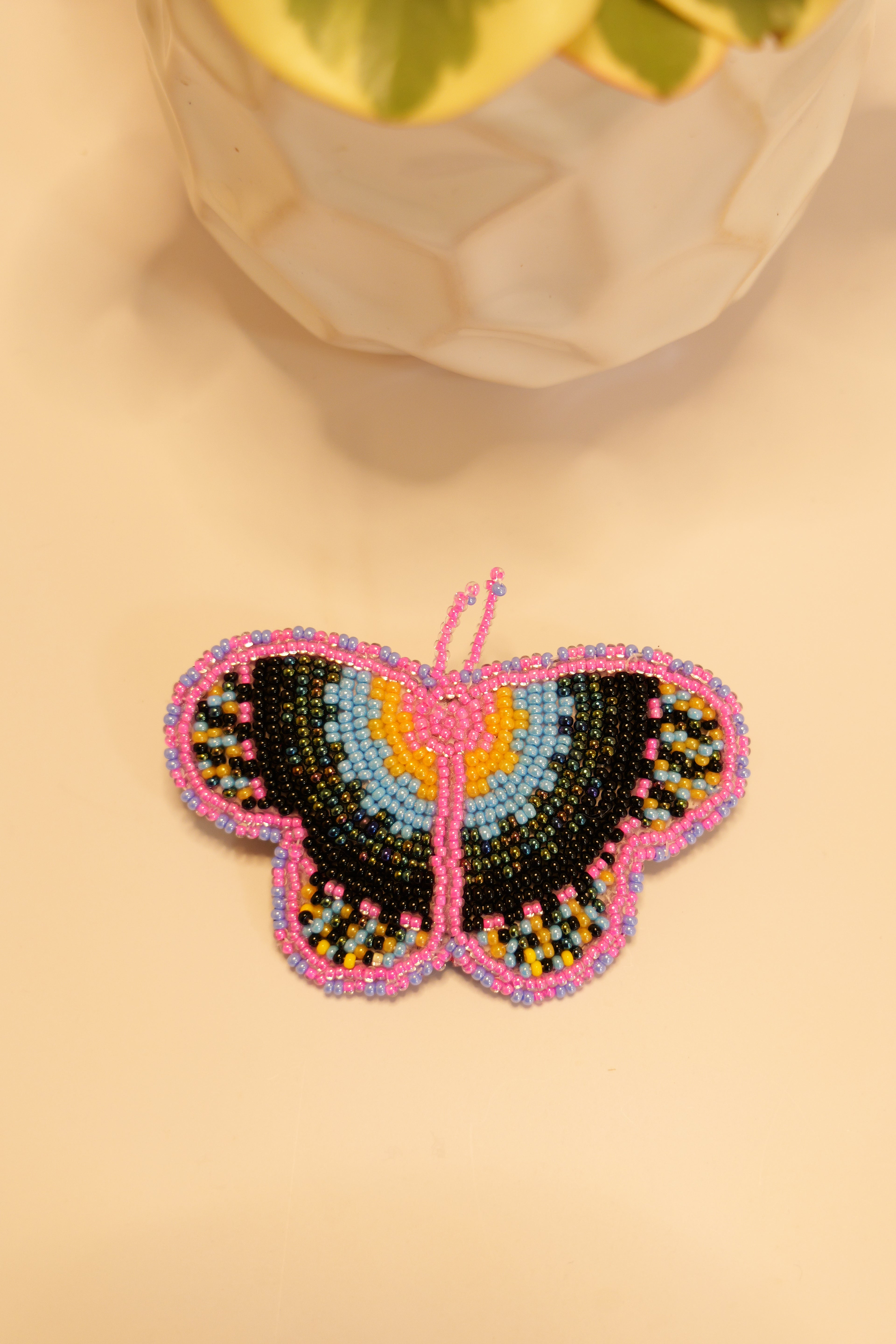 Handbeaded butterfly hair clip | leather backing