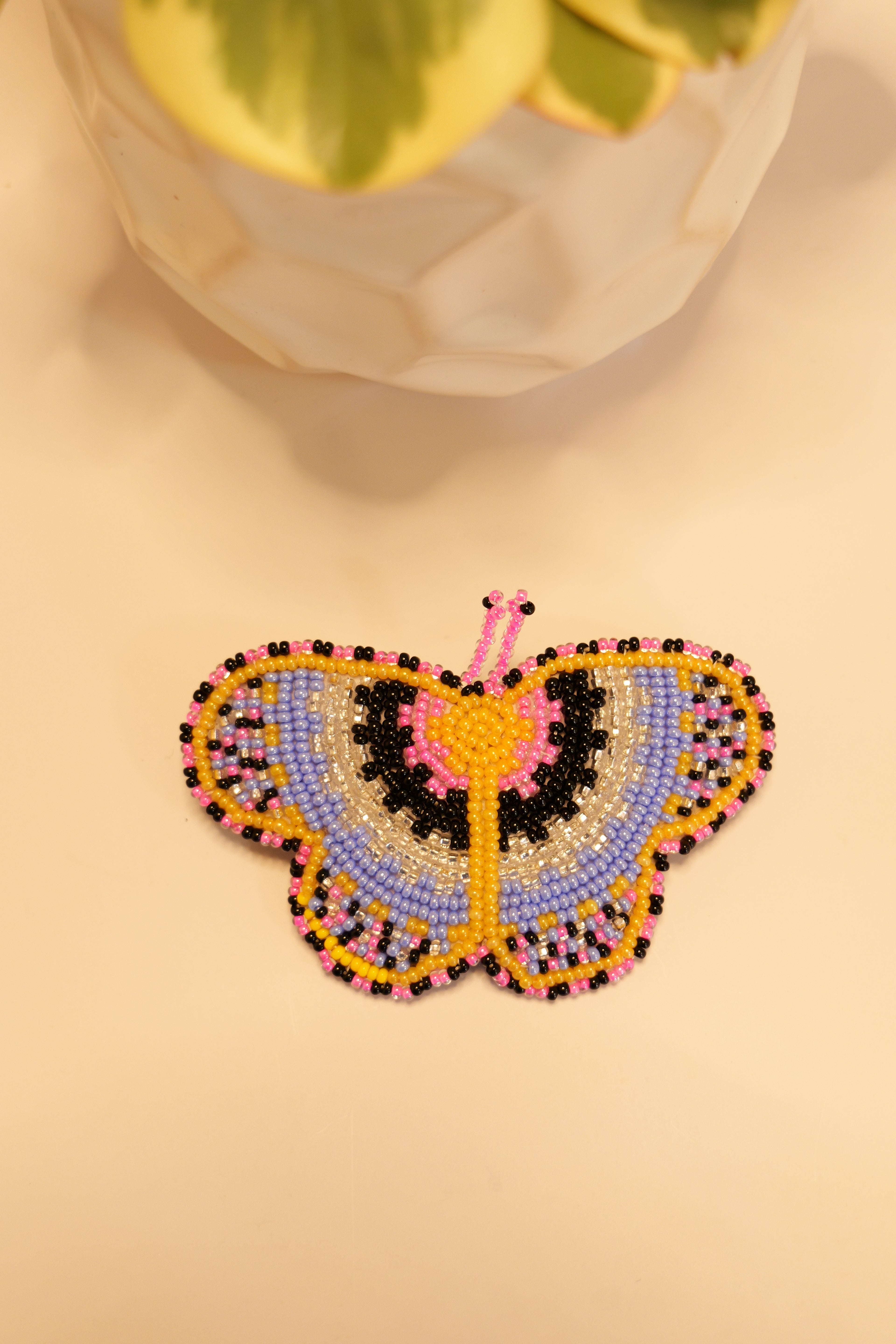 Handbeaded butterfly hair clip | leather backing