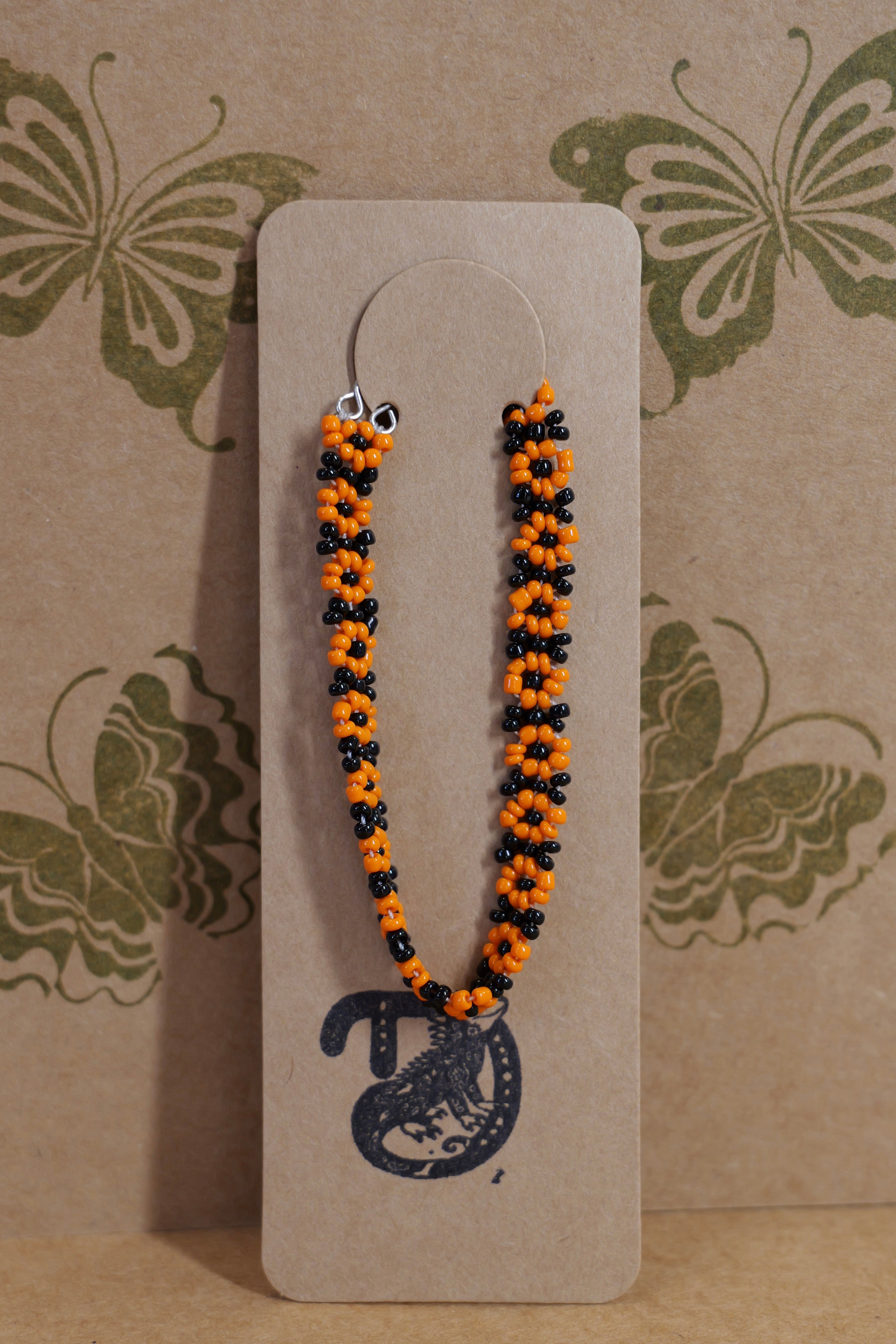 Hand beaded daisy bracelet