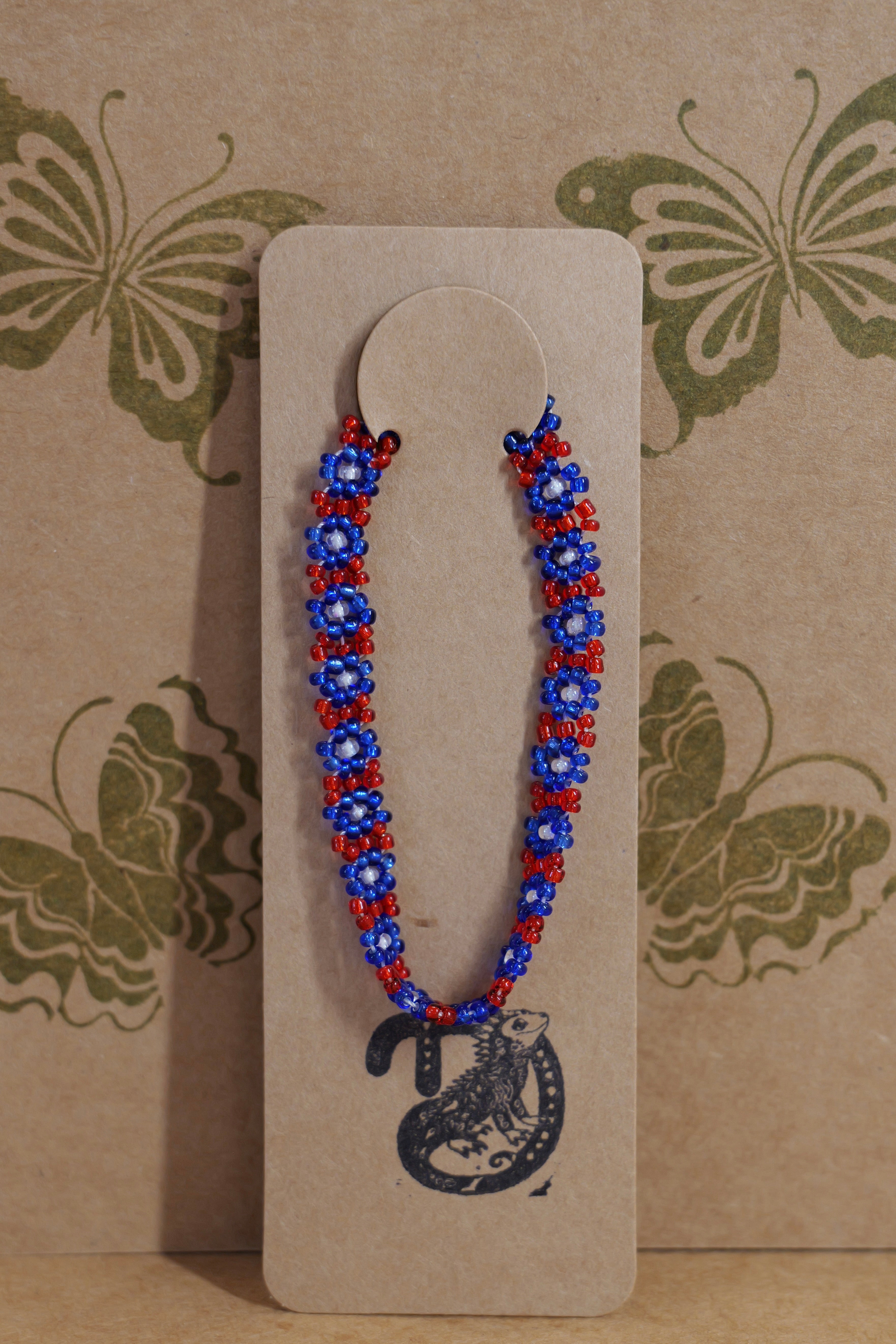 Hand beaded daisy bracelet