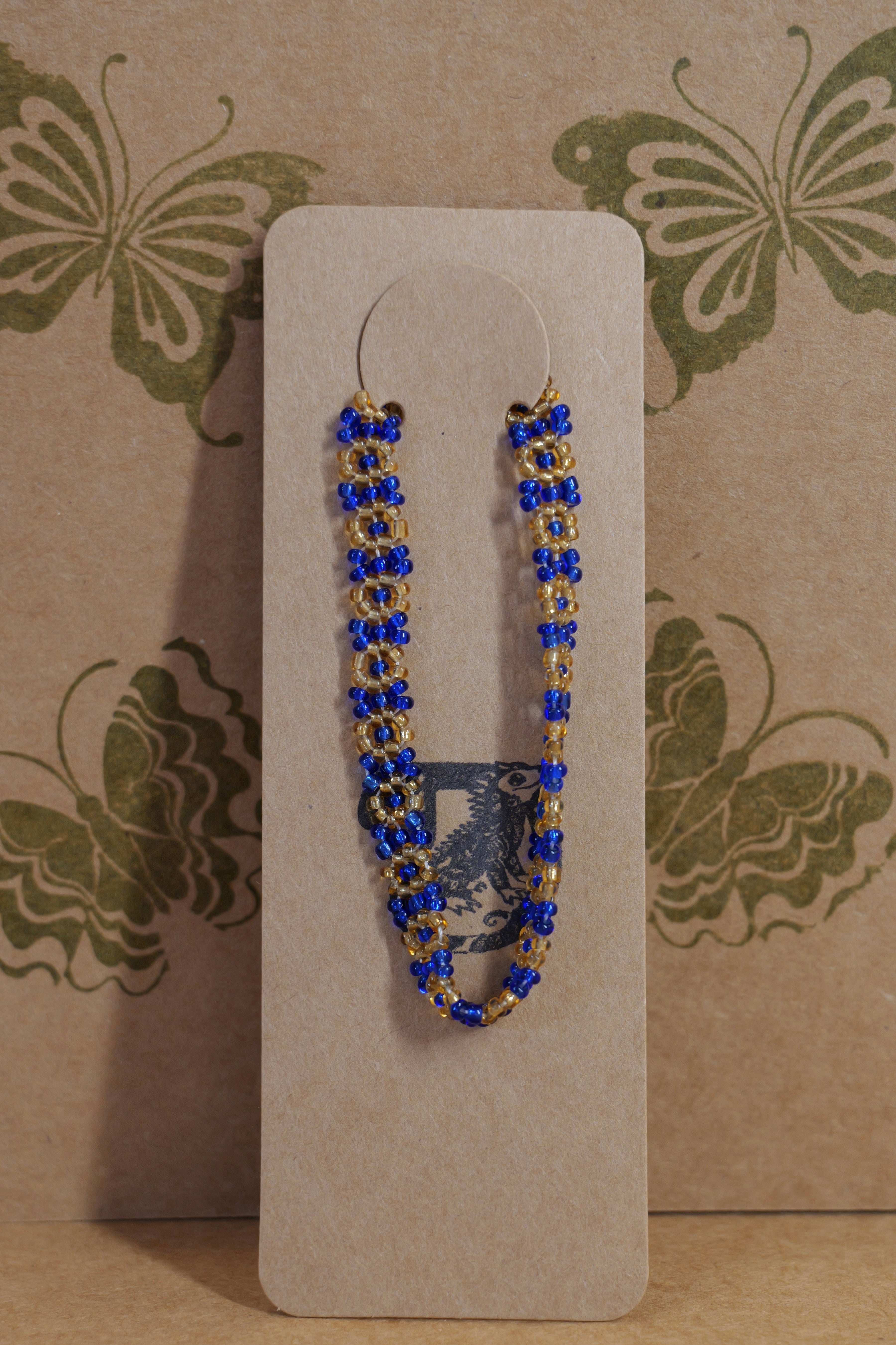 Hand beaded daisy bracelet