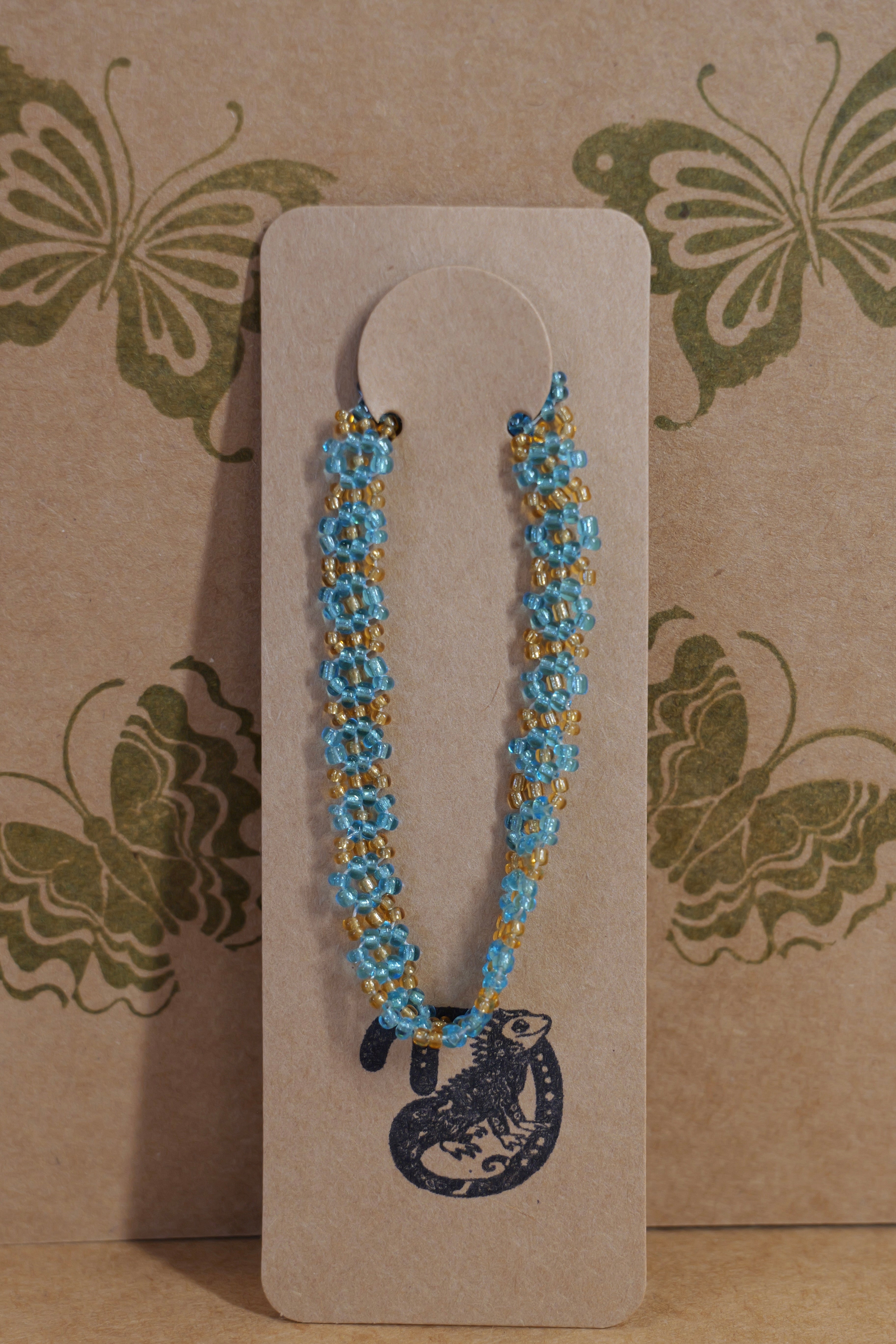 Hand beaded daisy bracelet