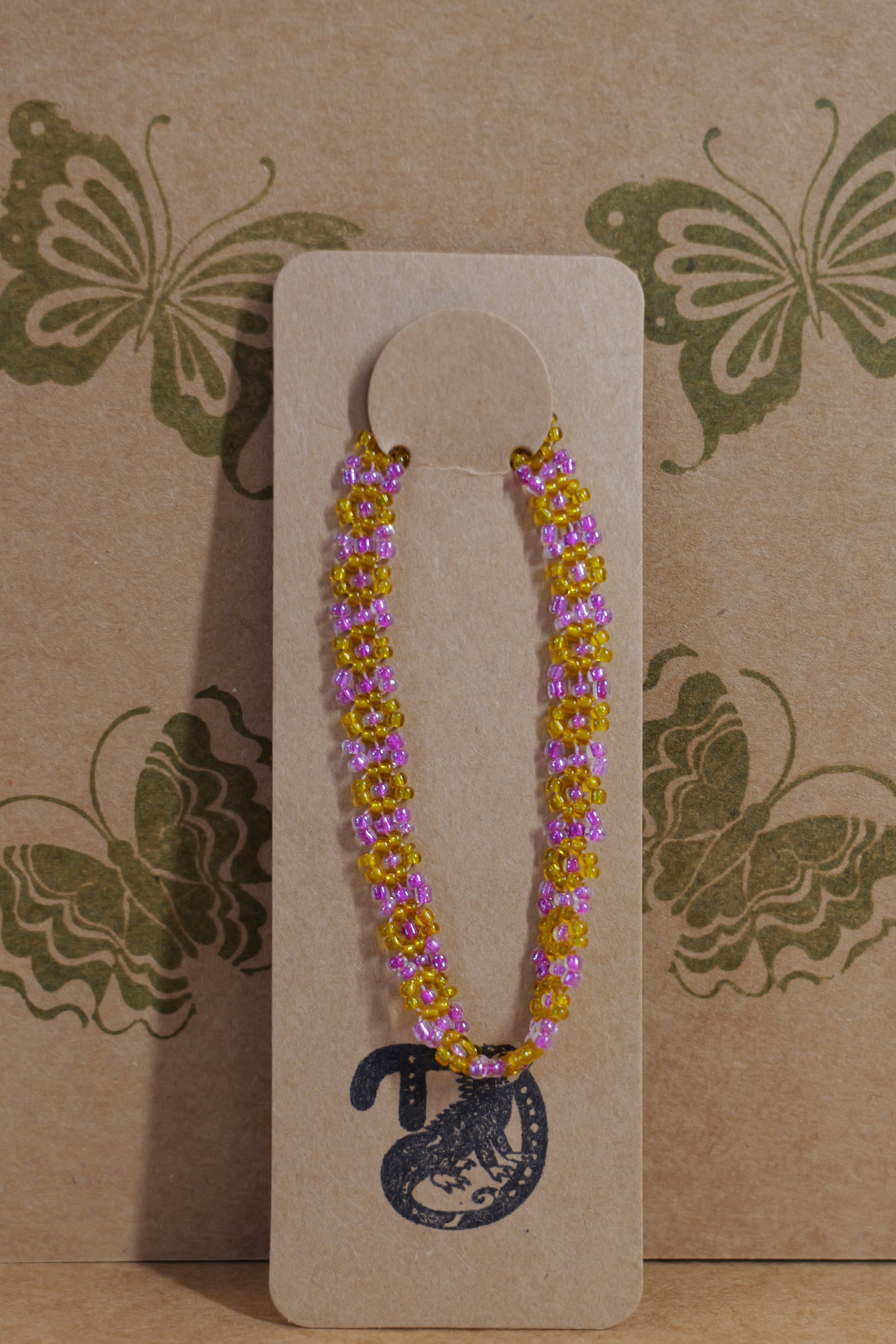 Hand beaded daisy bracelet