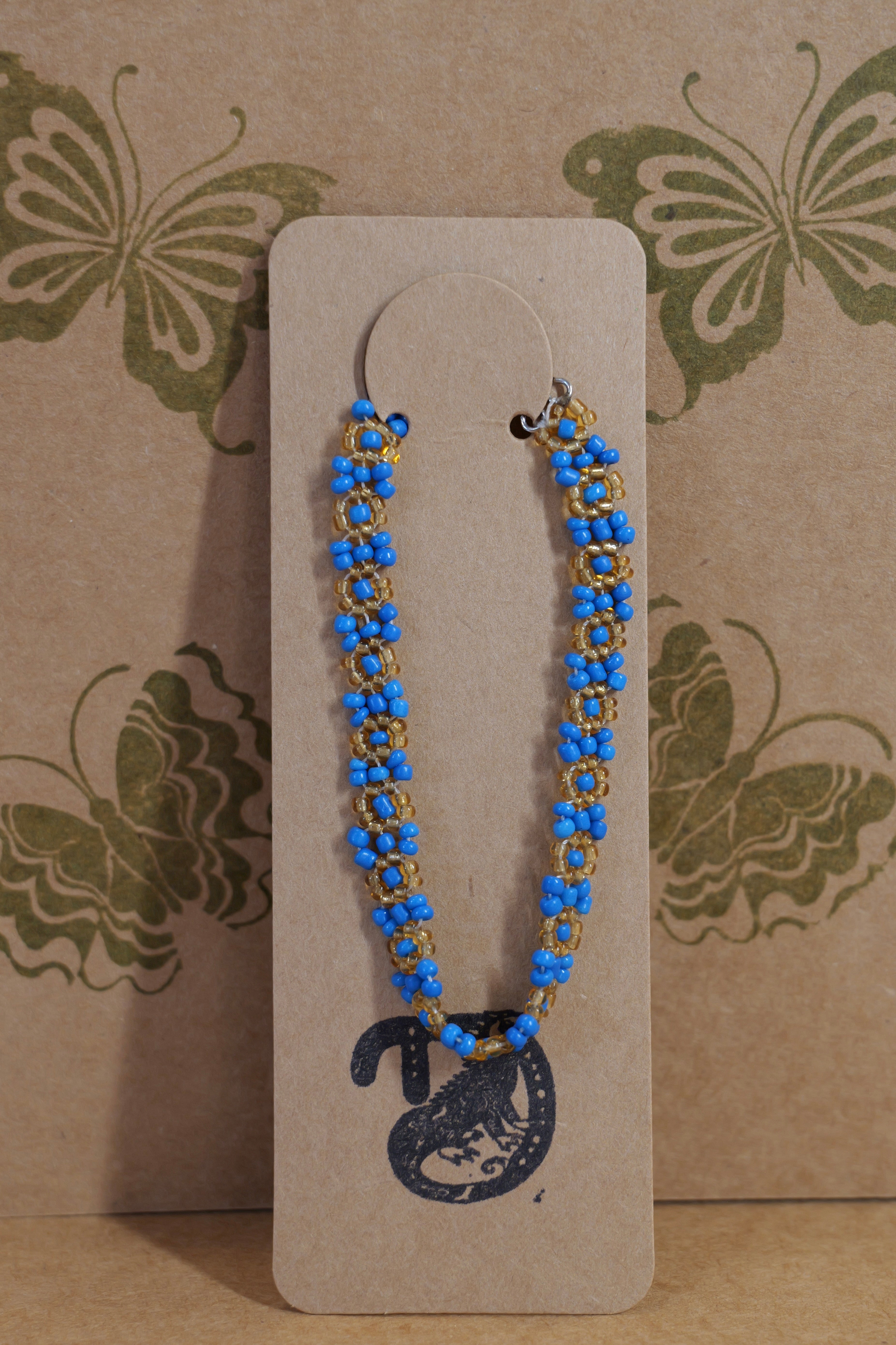 Hand beaded daisy bracelet