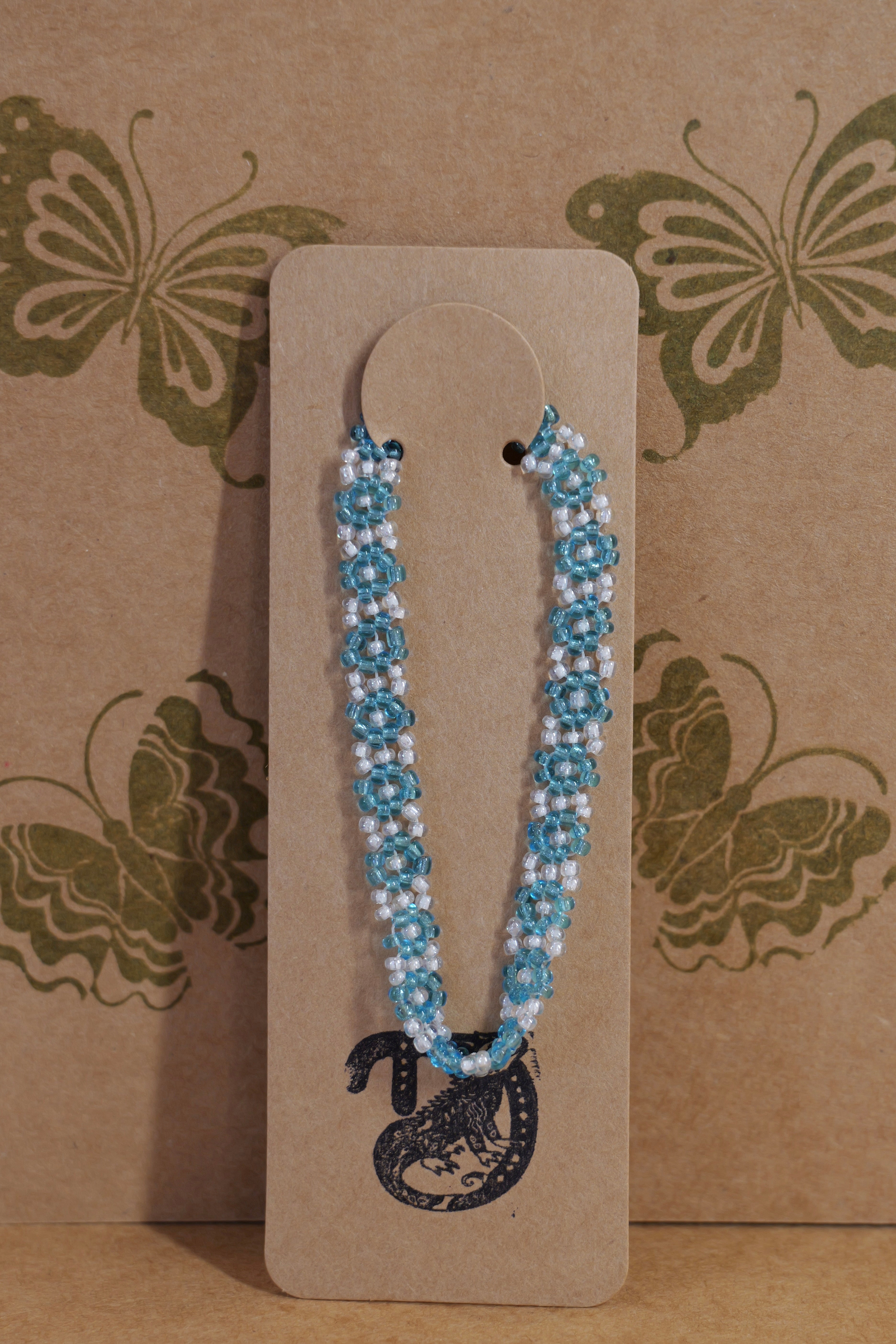 Hand beaded daisy bracelet